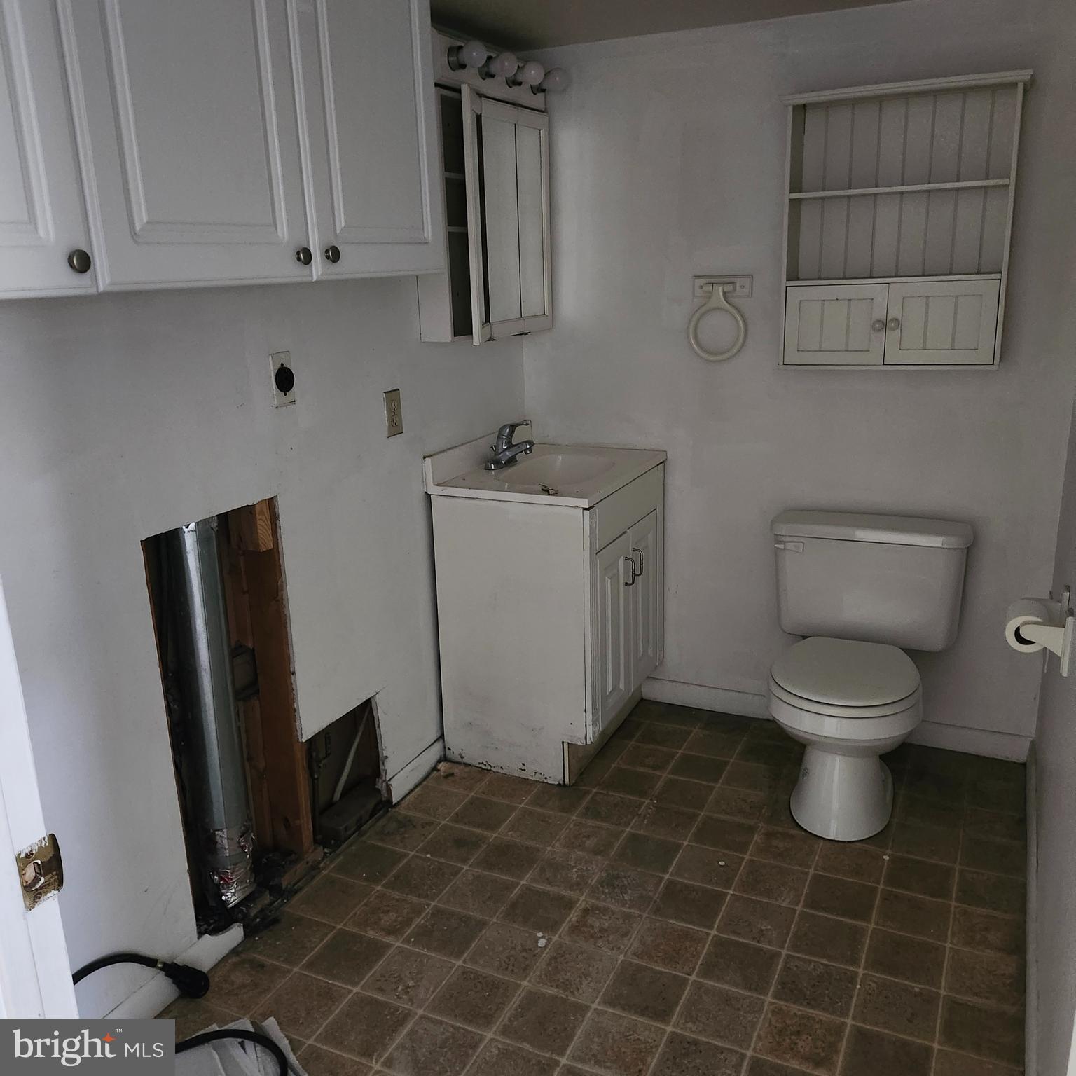 327 A Parkview Road Reading, PA 19606 - Photo 7 of 10 a bathroom with a sink a toilet and a mirror