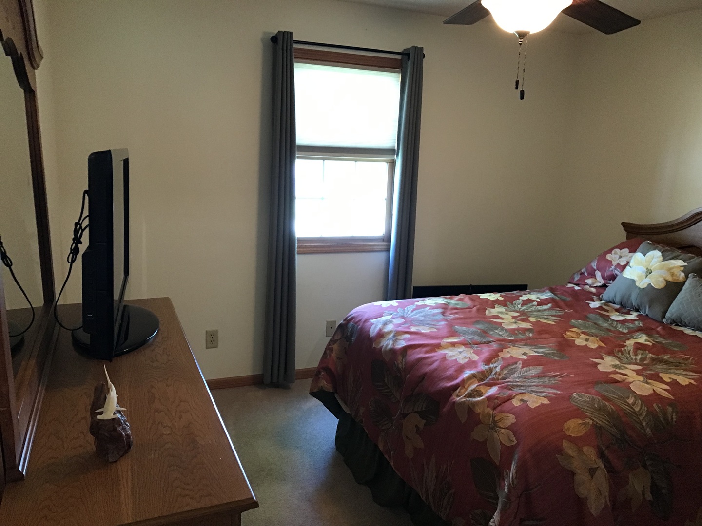115 Seneca Lane Loda, IL 60948 - Photo 12 of 21 a bed sitting in a bedroom next to a window