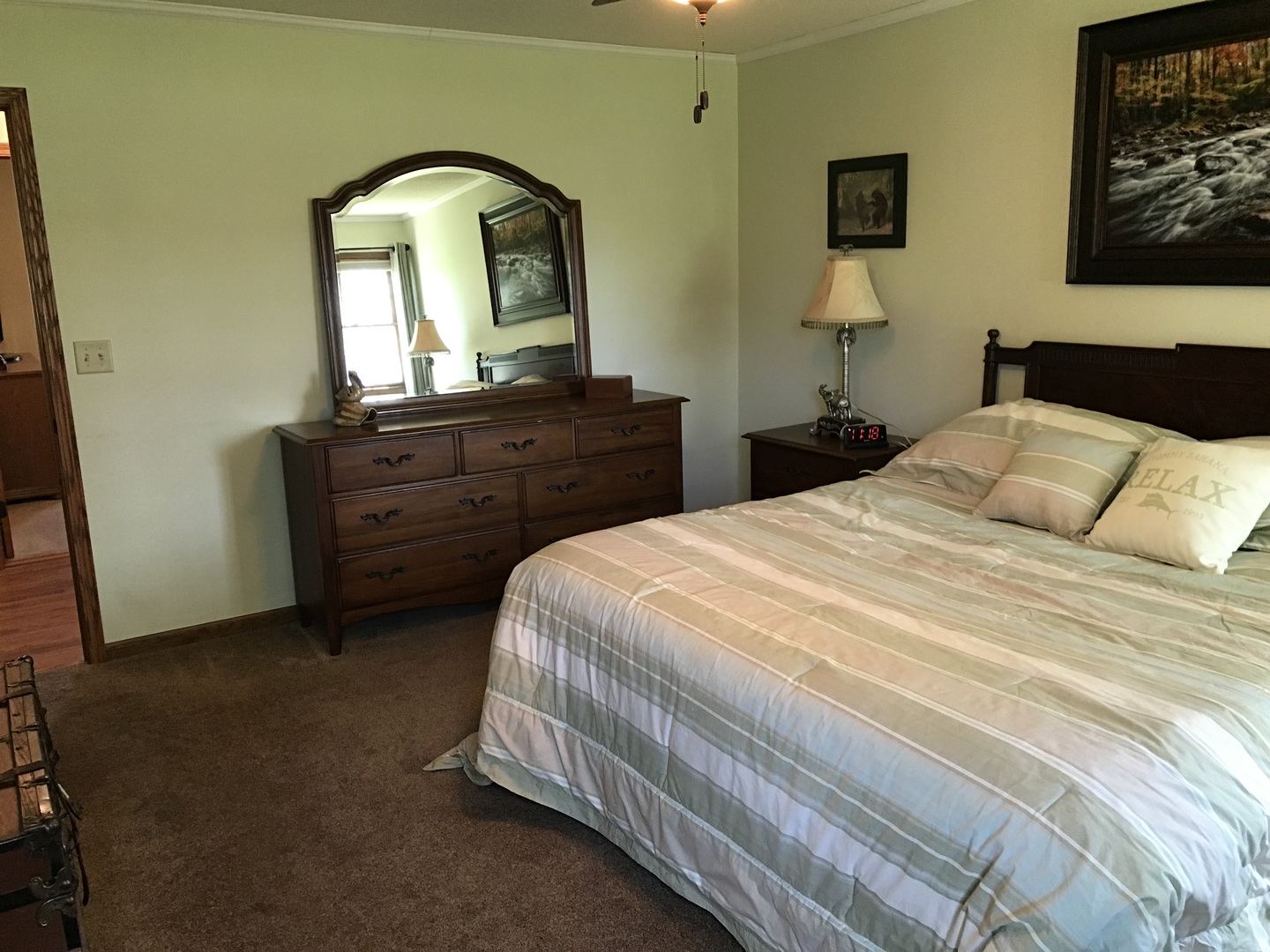 115 Seneca Lane Loda, IL 60948 - Photo 10 of 21 a bedroom with a bed and a mirror on dresser