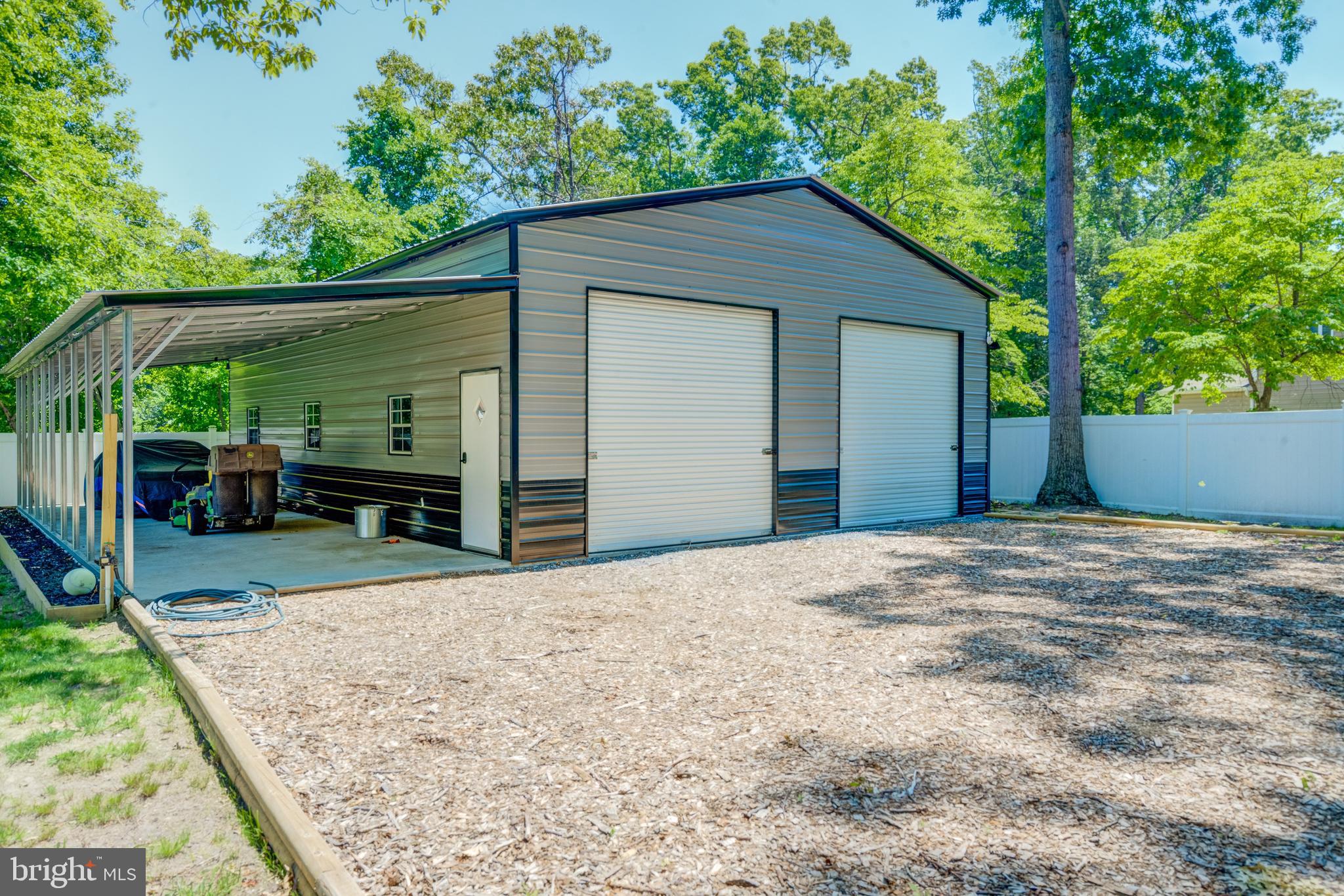 8331 Woodland Road Pasadena, MD 21122 - Photo 41 of 63 30x40 Garage with 12x40 Lean to