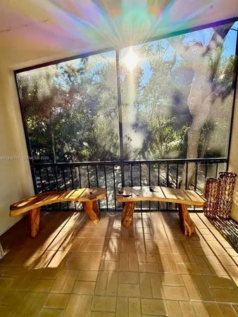 a view of swimming pool with a lounge chair