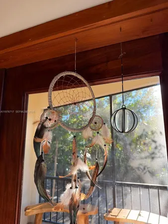 a picture of a glass door with a mirror