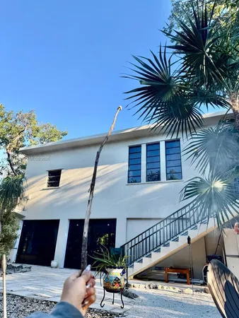 a view of balcony with furniture