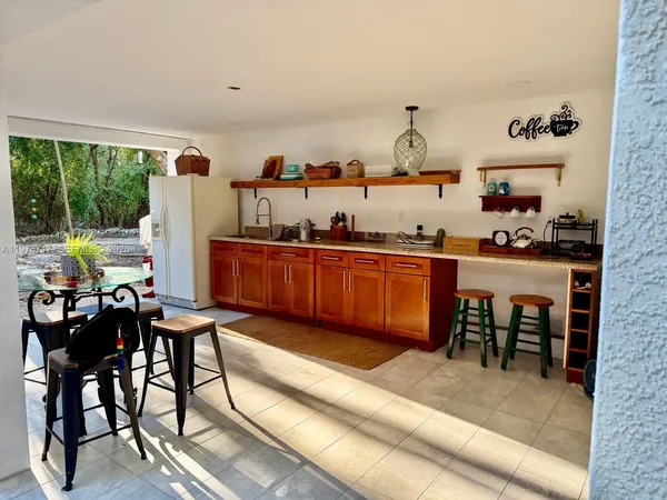 a view of balcony with furniture