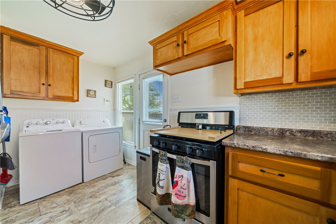 3651 Lawnview Street Corpus Christi, TX 78411 - Photo 17 of 38 a kitchen with stainless steel appliances granite countertop a stove and a sink