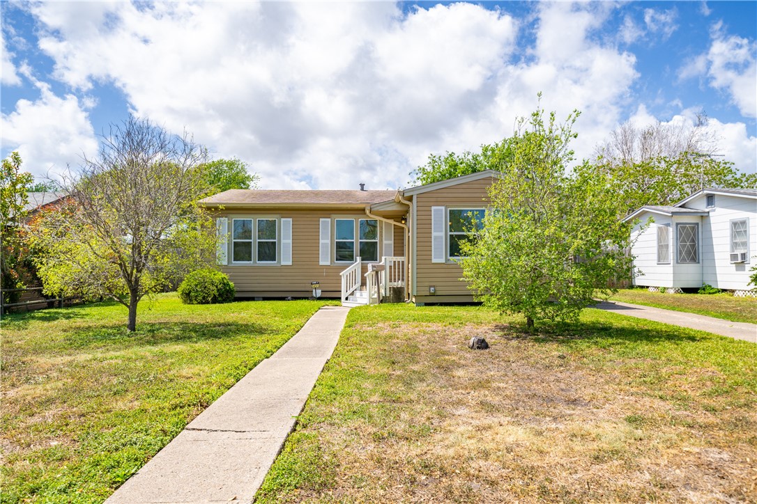 3651 Lawnview Street Corpus Christi, TX 78411 - Photo 2 of 38 a view of a house with a yard