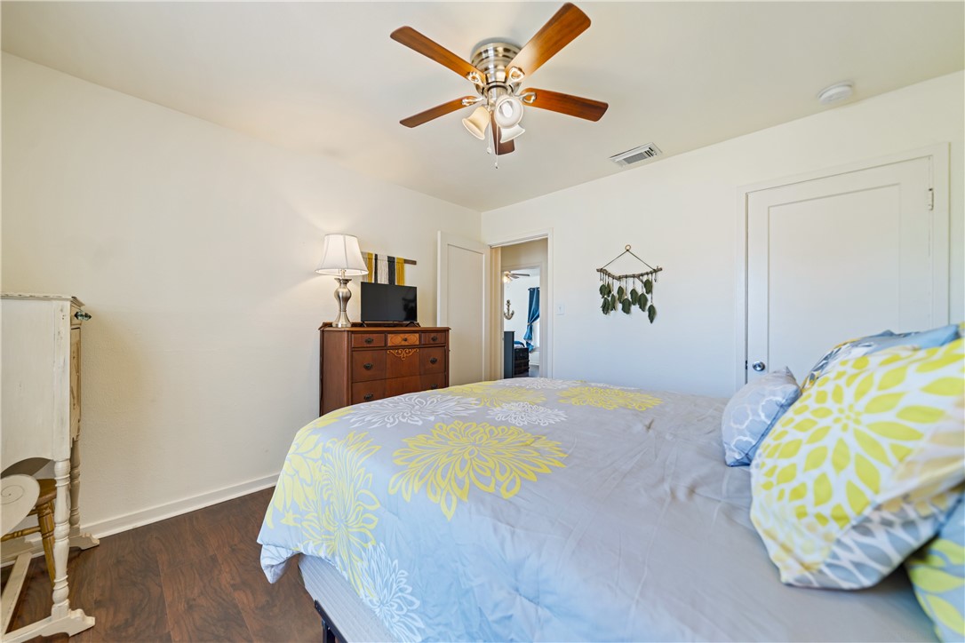 3651 Lawnview Street Corpus Christi, TX 78411 - Photo 21 of 38 a bedroom with a bed and a table