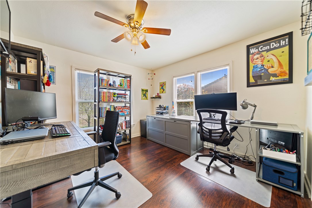 3651 Lawnview Street Corpus Christi, TX 78411 - Photo 22 of 38 a view of a workspace with furniture and a bookshelf
