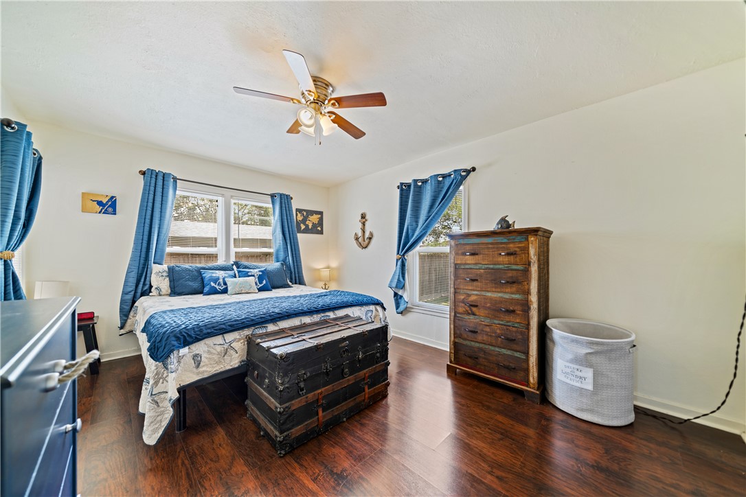 3651 Lawnview Street Corpus Christi, TX 78411 - Photo 25 of 38 a bed room with a bed and a window