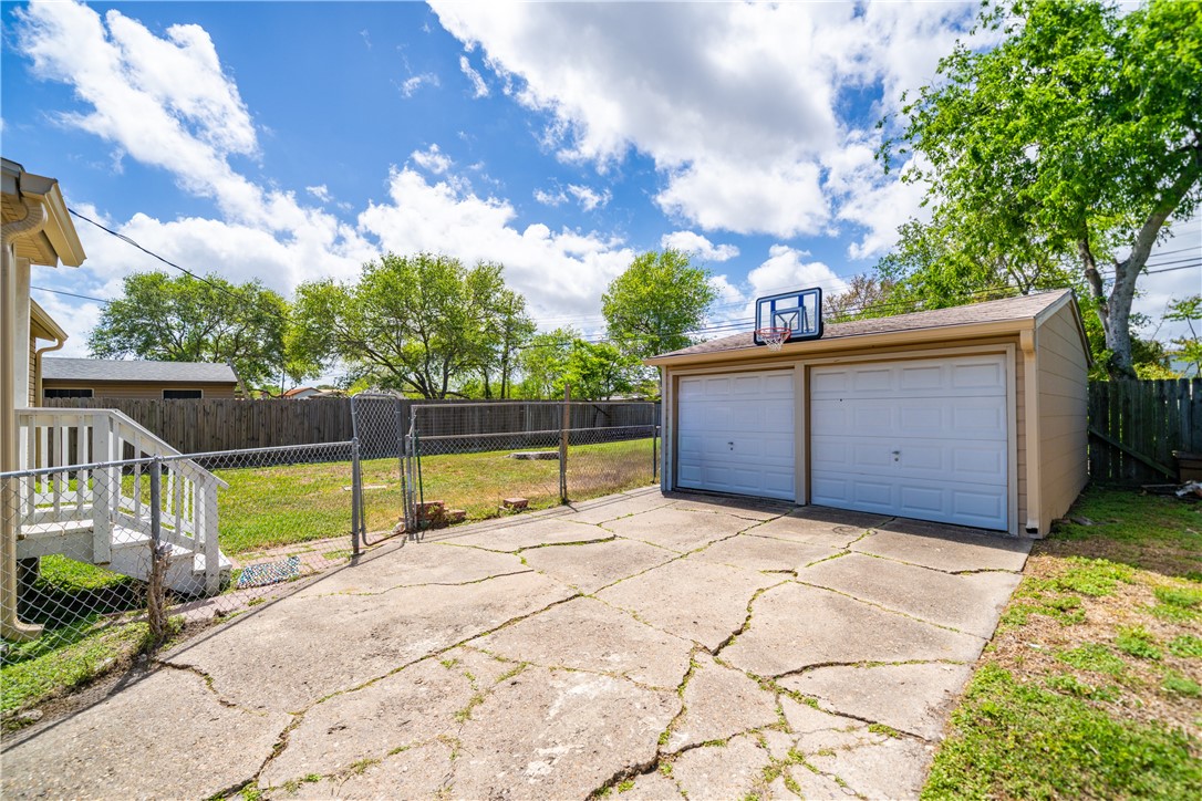 3651 Lawnview Street Corpus Christi, TX 78411 - Photo 28 of 38 a view of backyard with swimming pool and seating area
