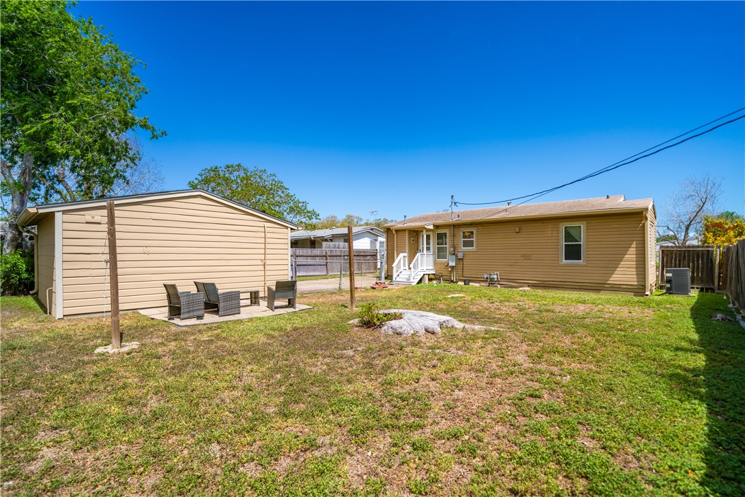 3651 Lawnview Street Corpus Christi, TX 78411 - Photo 31 of 38 a view of a house with backyard and sitting area