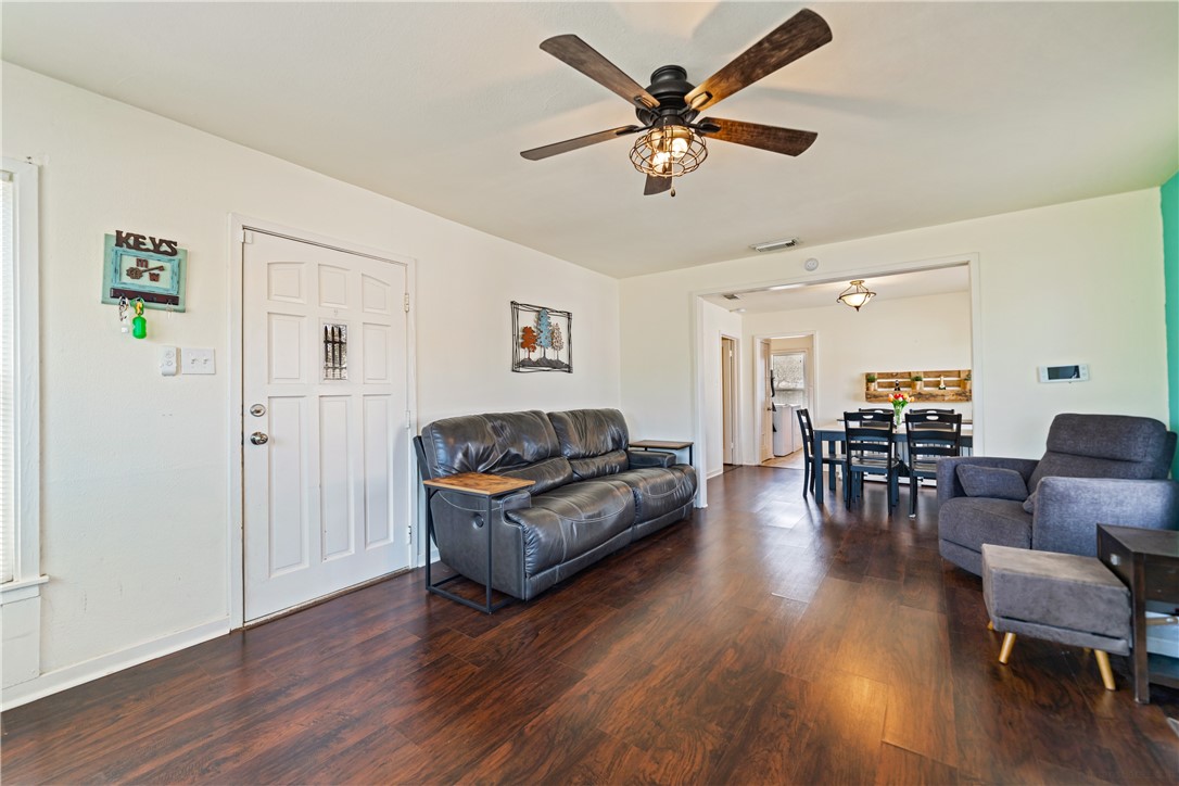 3651 Lawnview Street Corpus Christi, TX 78411 - Photo 6 of 38 a living room with furniture and wooden floor