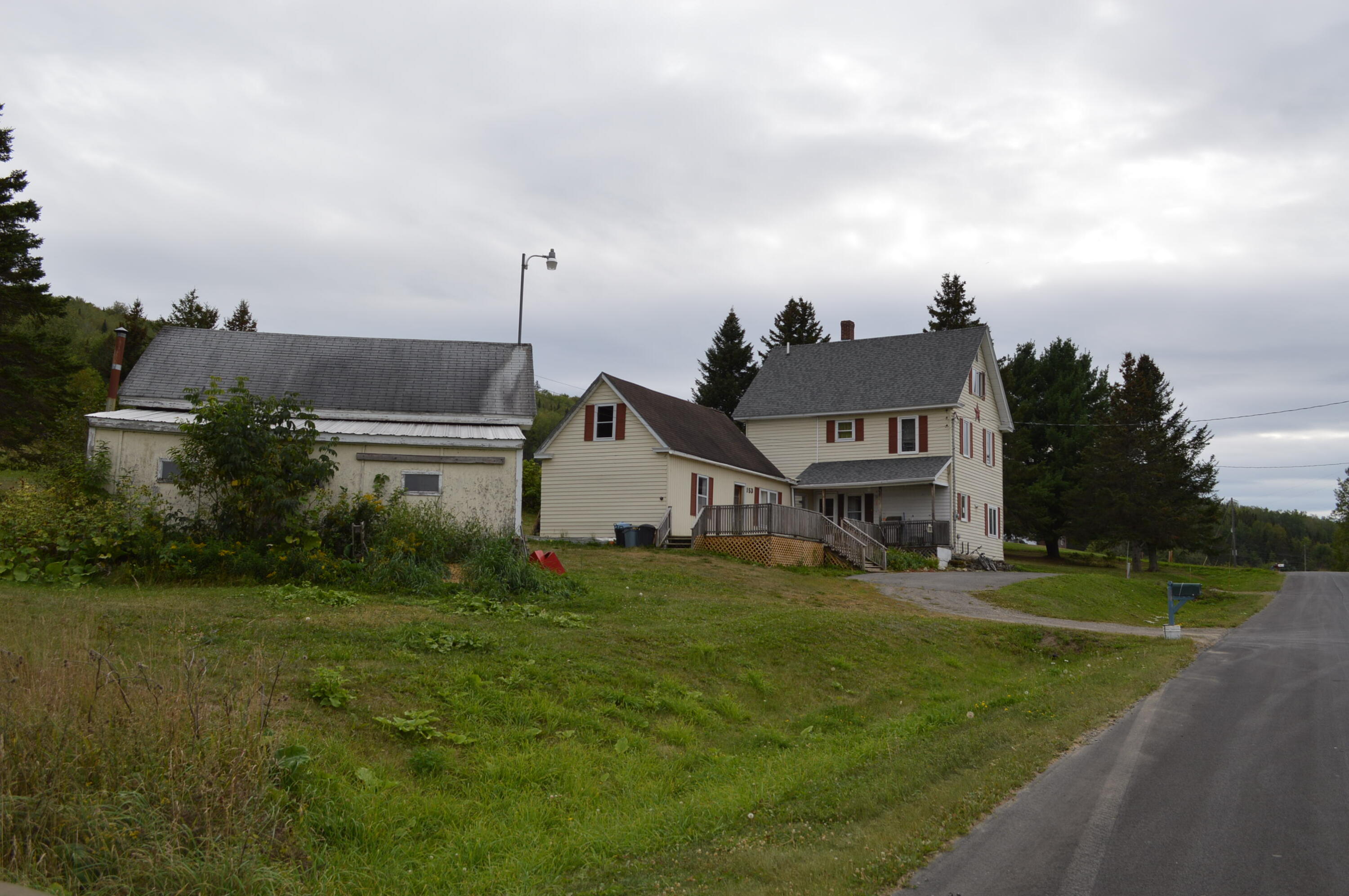 153 Pelletier Road Fort Kent, ME 04743 - Photo 6 of 36 House from left side