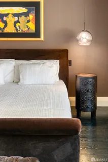 a utility room with a sink a vanity and a shower