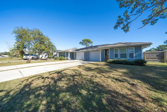 a house view with a swimming pool