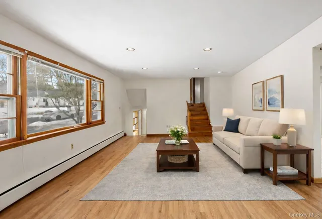 a kitchen with stainless steel appliances granite countertop a stove and a refrigerator
