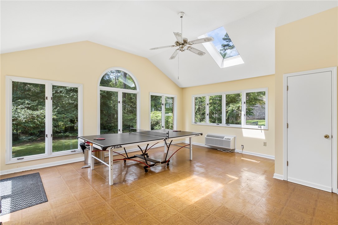 207 Laurel Ridge Road Anderson, SC 29621 - Photo 21 of 50 A spacious sunroom offers bright views of surrounding trees, perfect for leisure and relaxation.