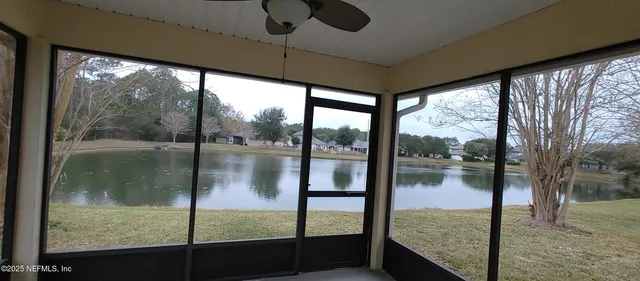 a kitchen with a sink and refrigerator