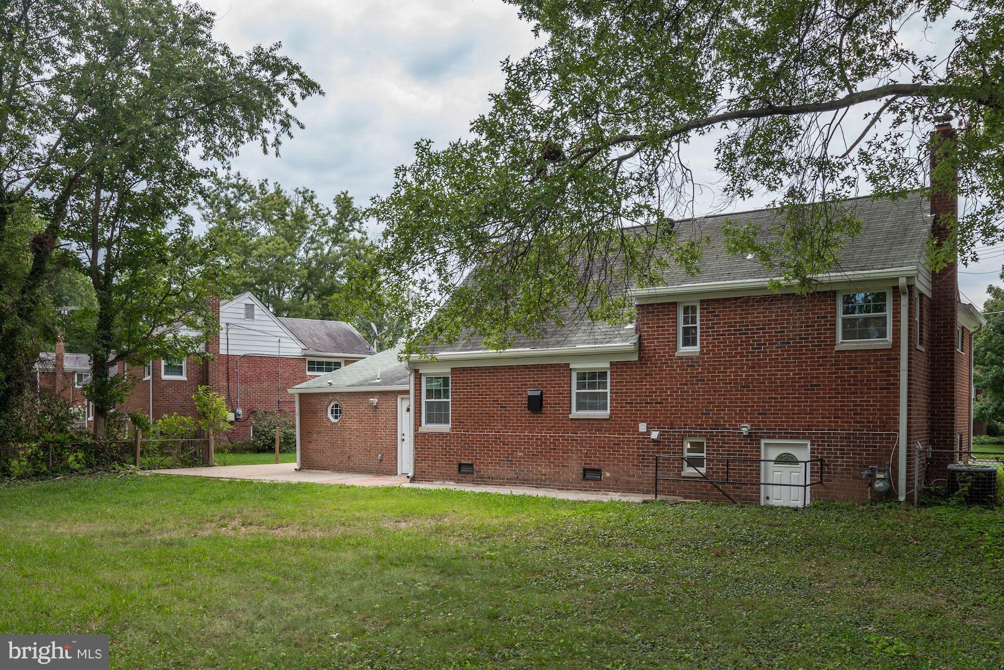 6916 Gilbert Street Springfield, VA 22150 - Photo 23 of 26 a view of a house with a yard