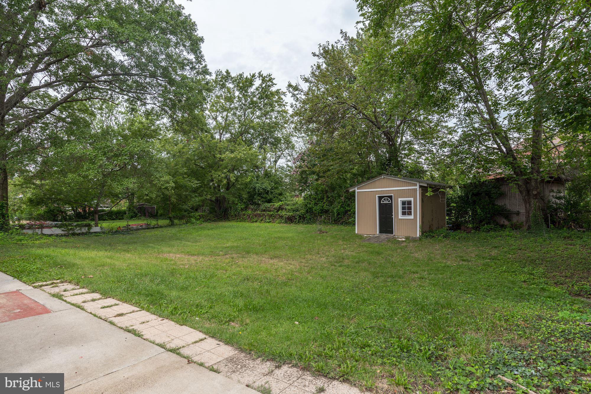 6916 Gilbert Street Springfield, VA 22150 - Photo 24 of 26 a house view with a garden