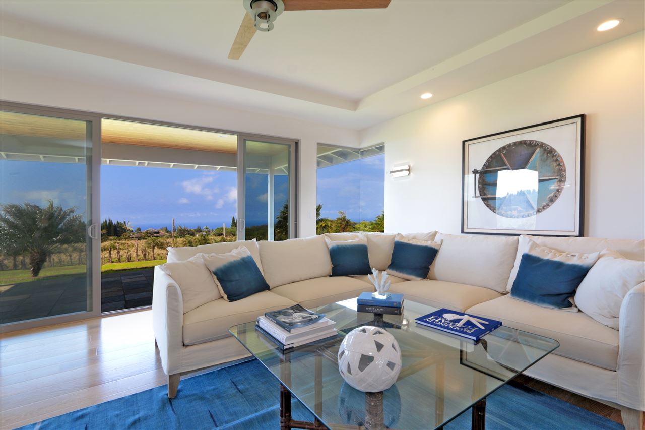 1855 A Kauhikoa Road Haiku, HI 96708 - Photo 1 of 30 a living room with furniture and wooden floor