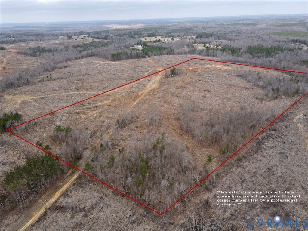 0 New Grove Road Kenbridge, VA 23944 - Photo 4 of 9 a view of a dry yard with wooden fence