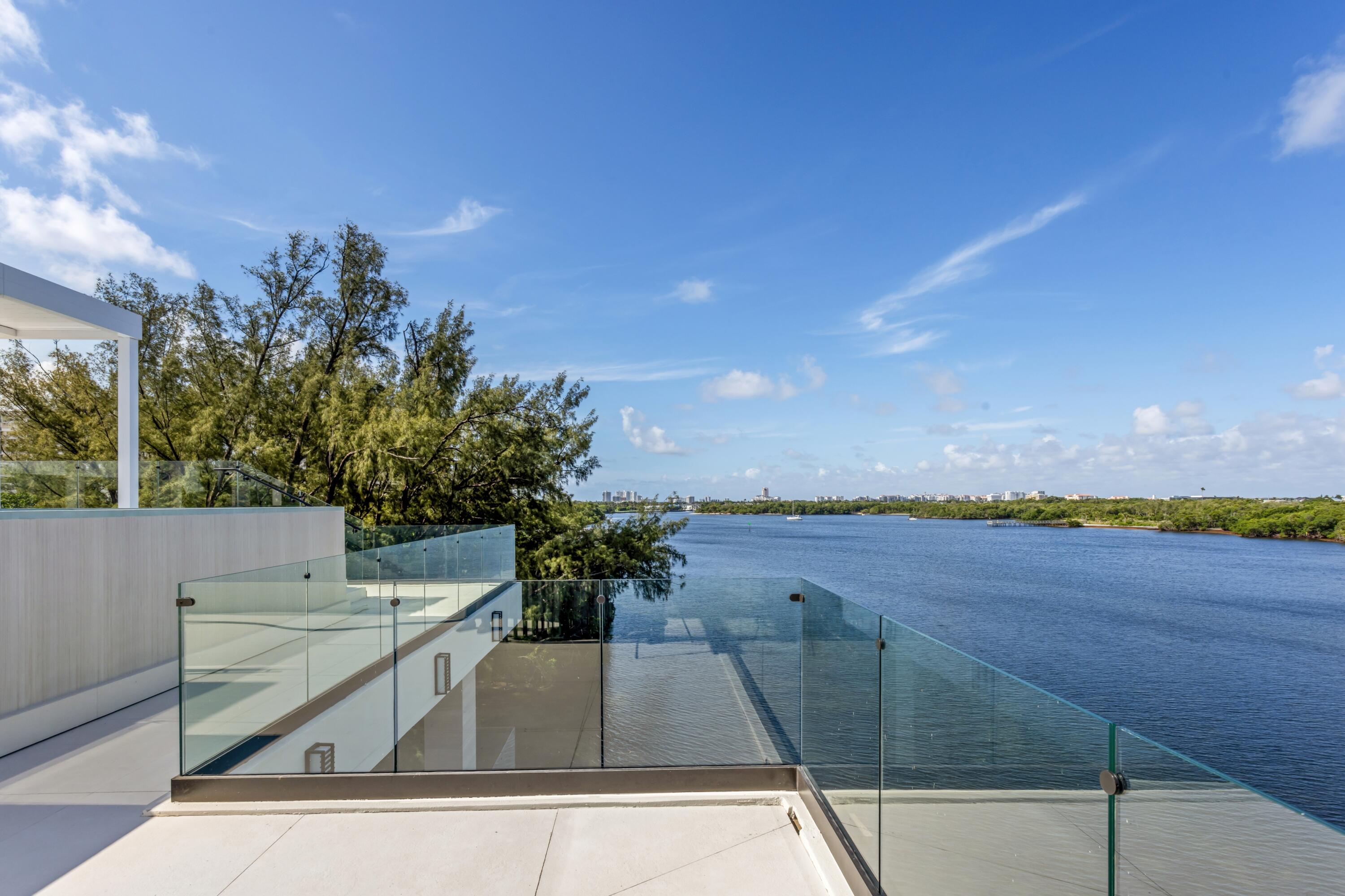 900 Lago Mar Lane, Unit PH Boca Raton, FL 33431 - Photo 2 of 58 a view of outdoor space and city view