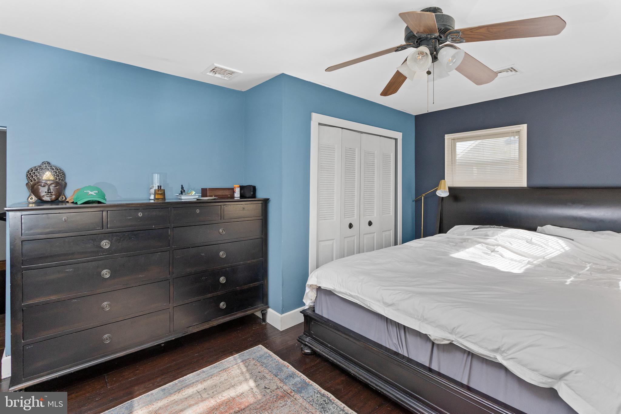 942 Province Line Road Allentown, NJ 08501 - Photo 33 of 50 a bedroom with a bed and a chandelier