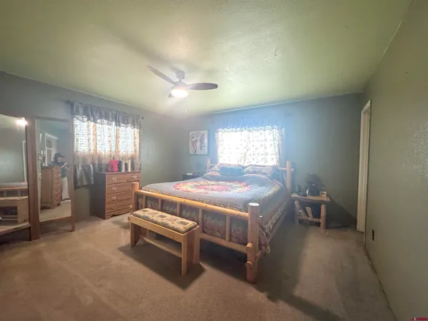 a terrace of a house with outdoor seating