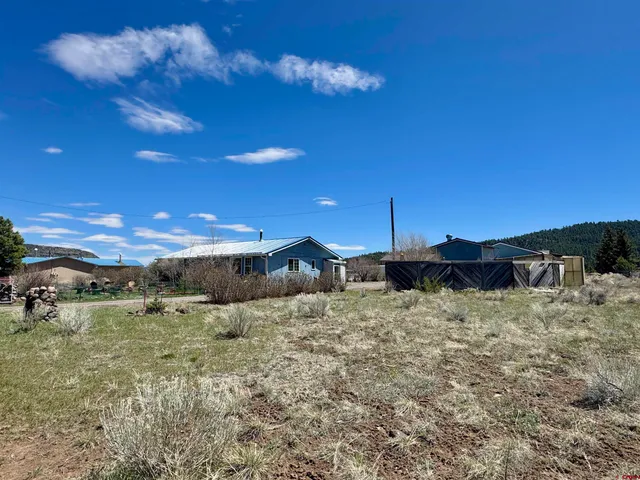 a picture of a book and a white wall