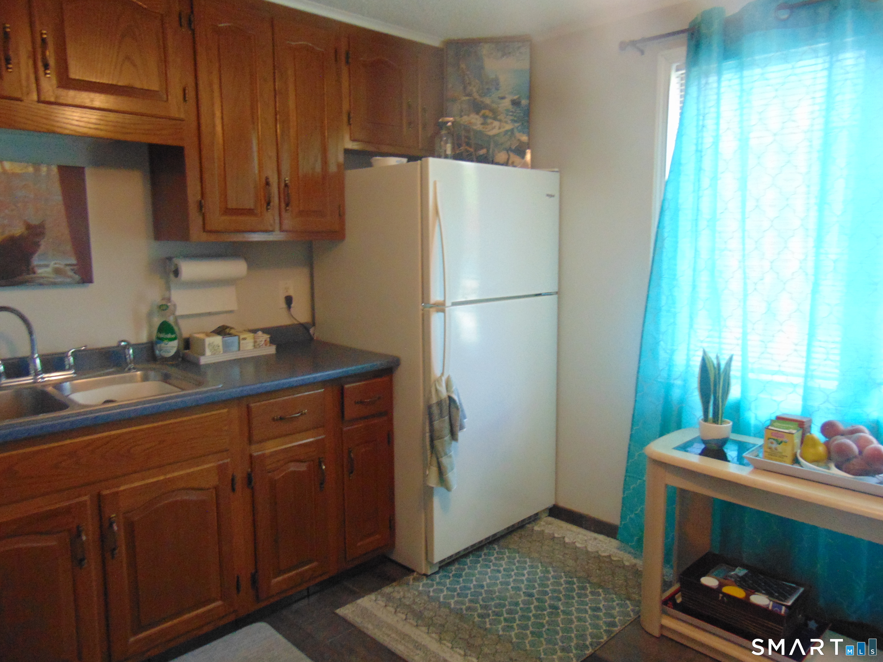 882 North Colony Road, Unit 31 Meriden, CT 06450 - Photo 20 of 34 a kitchen with stainless steel appliances granite countertop a refrigerator and a sink