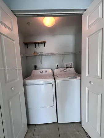 a bathroom with a toilet a sink and a bathtub