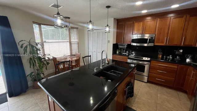 a view of a livingroom with a flat screen tv