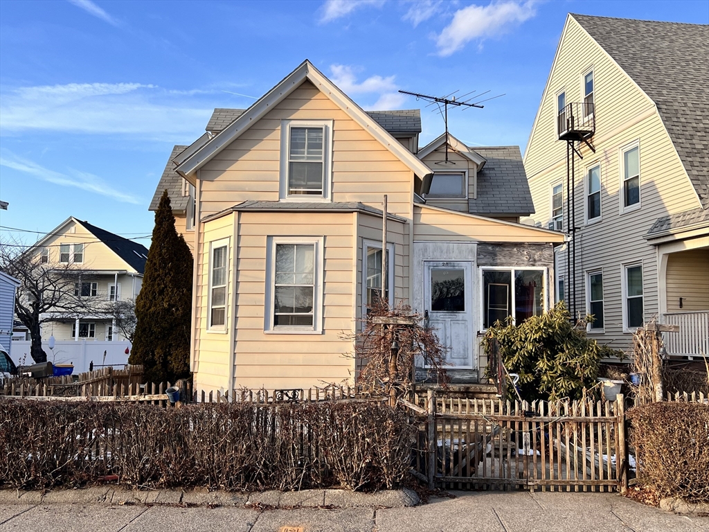 28 Irwin Street Winthrop, MA 02152 - Photo 1 of 3 a front view of a house with a yard