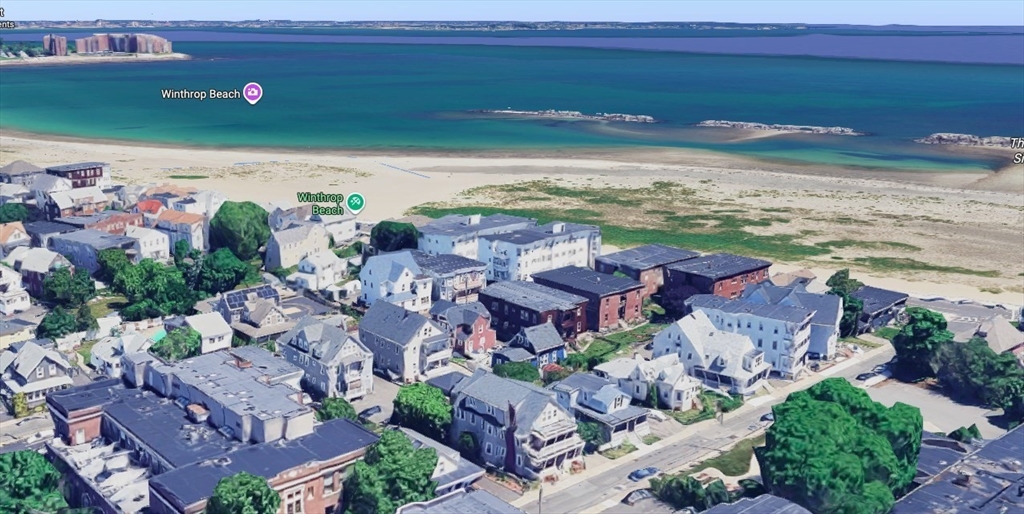 28 Irwin Street Winthrop, MA 02152 - Photo 3 of 3 a view of a city with an ocean