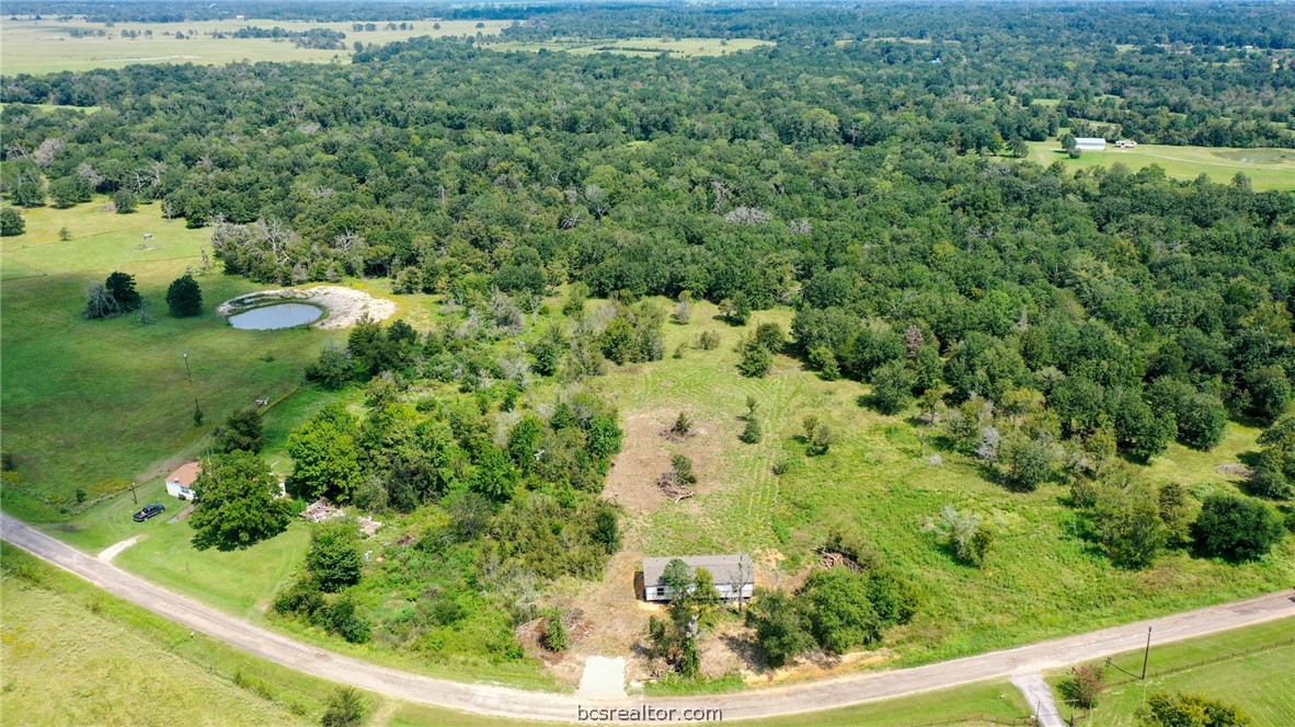 9960 Goose Prairie Road Midway, TX 75852 - Photo 31 of 36 a view of a garden with a house
