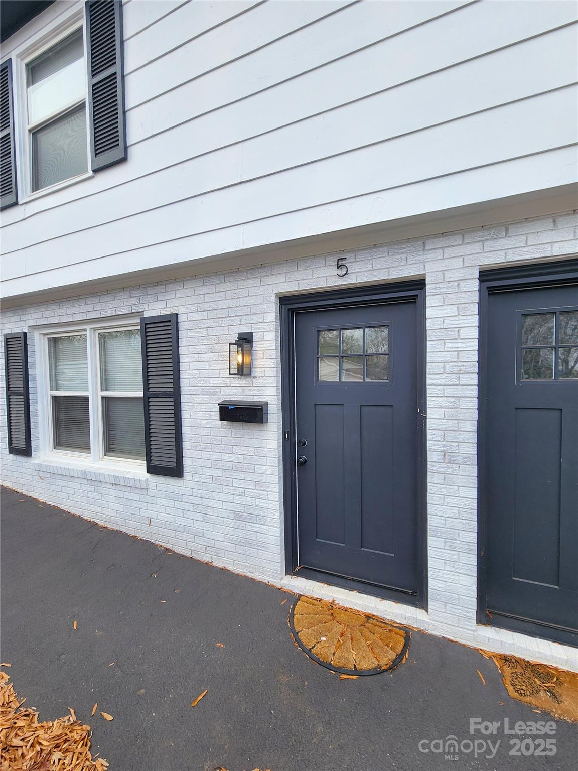 315 Hamilton Drive Northeast, Unit 5 Concord, NC 28025 - Photo 23 of 24 a view of front door of house