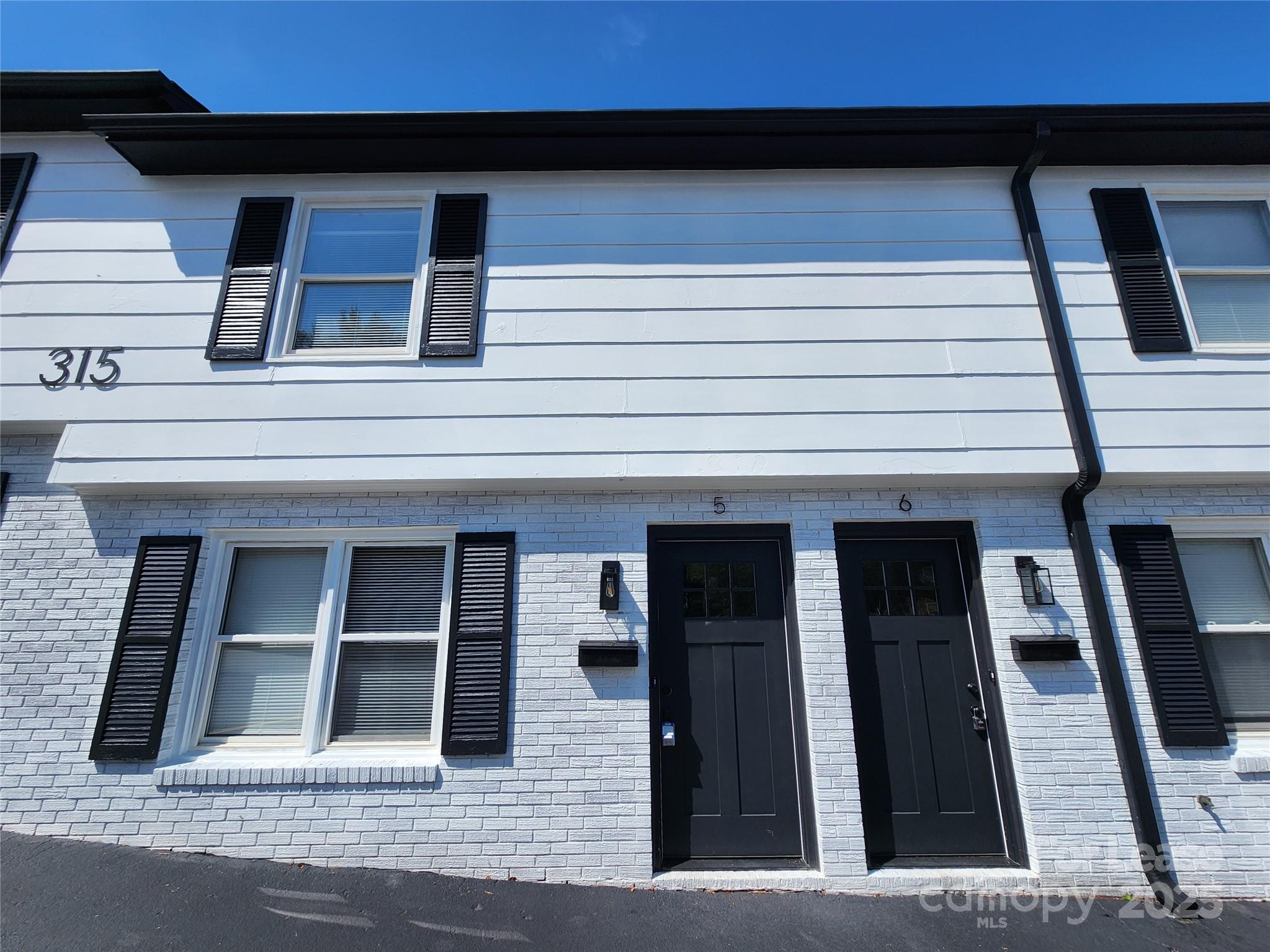 315 Hamilton Drive Northeast, Unit 5 Concord, NC 28025 - Photo 24 of 24 a view of building with door