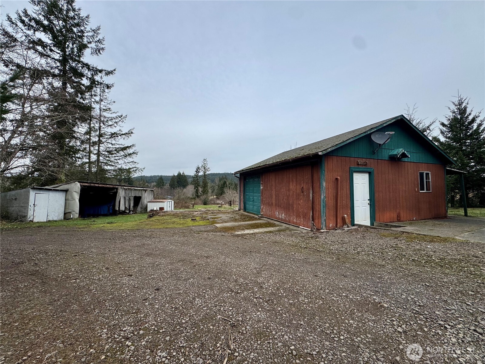 187 Wildcat Road Toutle, WA 98649 - Photo 11 of 21 a view of a house with backyard and trees