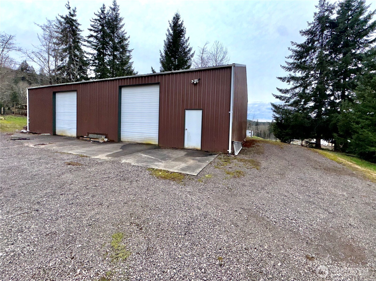 187 Wildcat Road Toutle, WA 98649 - Photo 13 of 21 a view of a house with backyard and trees
