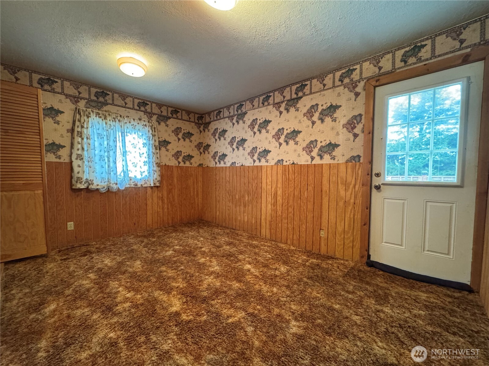 187 Wildcat Road Toutle, WA 98649 - Photo 7 of 21 a view of an empty room and window