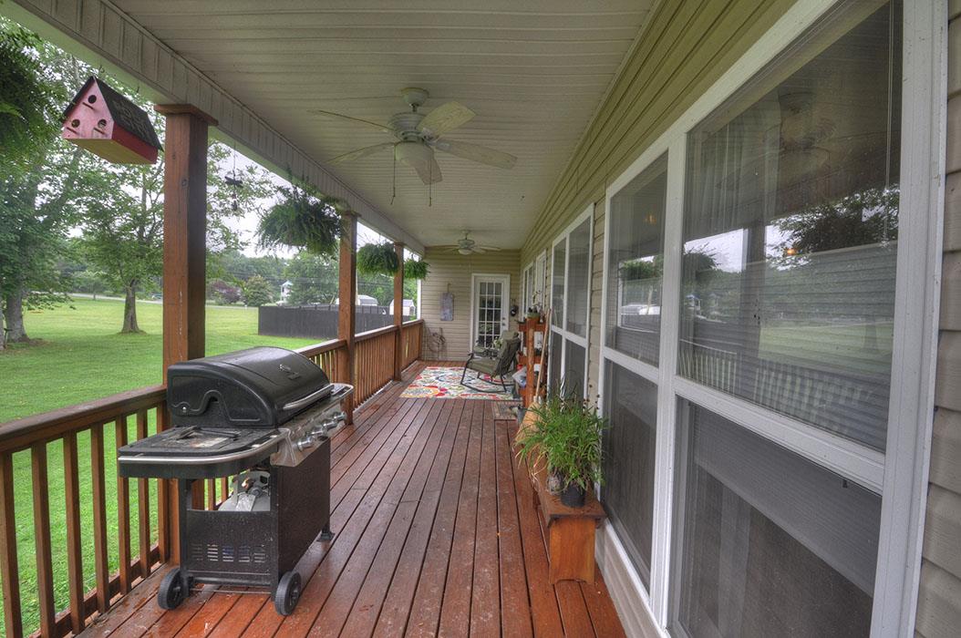 1103 Centerville Road Lebanon, TN 37087 - Photo 15 of 30 a view of balcony with chairs and wooden floor