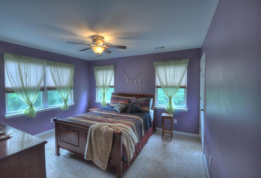 1103 Centerville Road Lebanon, TN 37087 - Photo 22 of 30 a bed sitting in a spacious bedroom next to a window