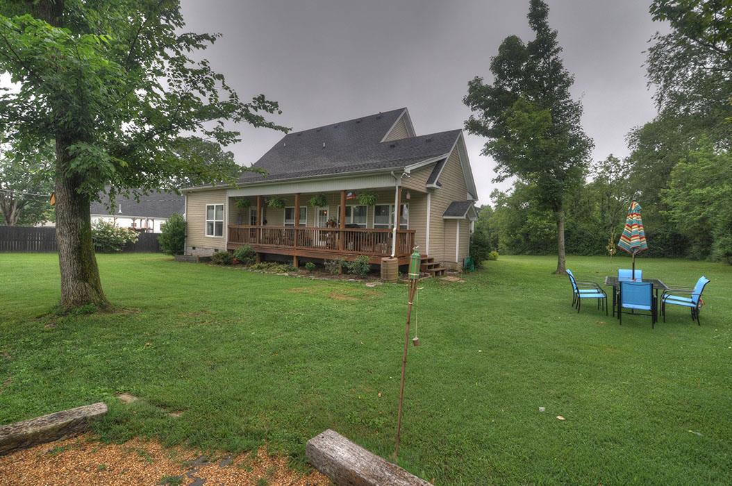 1103 Centerville Road Lebanon, TN 37087 - Photo 24 of 30 a view of a house with backyard porch and sitting area