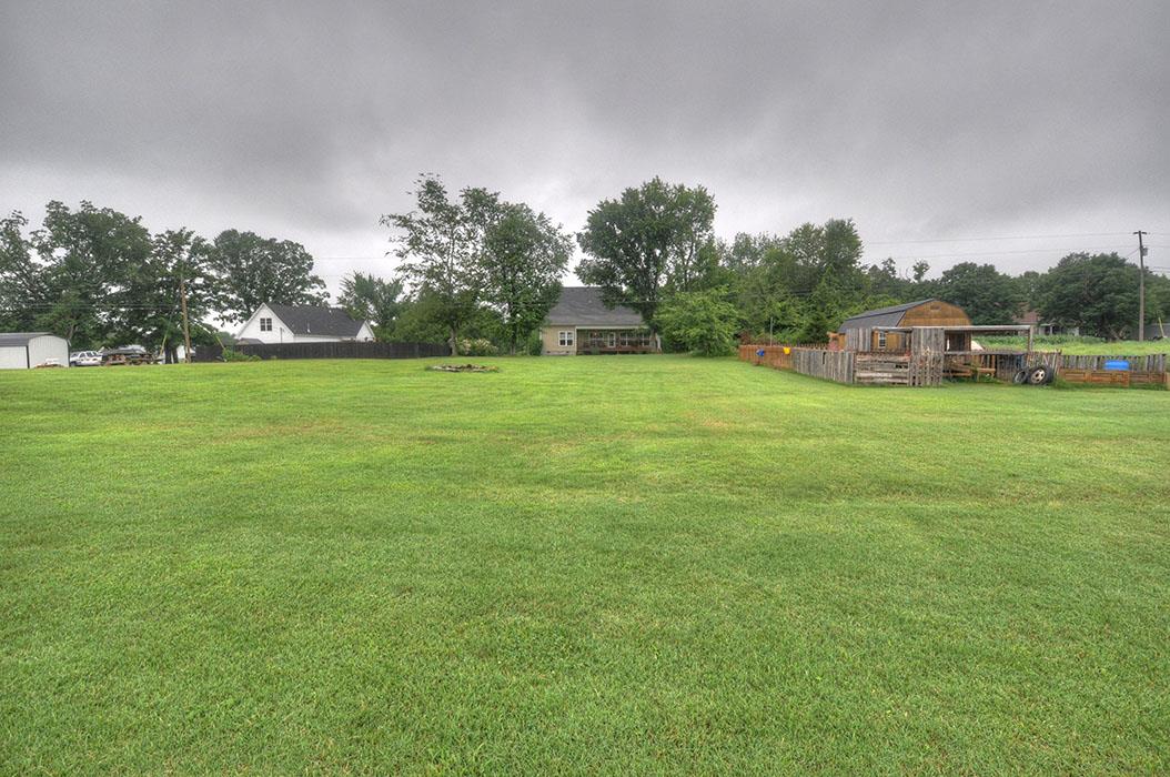 1103 Centerville Road Lebanon, TN 37087 - Photo 25 of 30 a backyard of a house with lots of green space