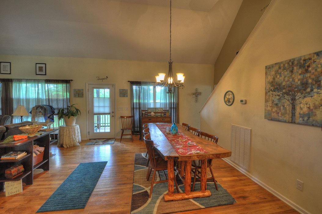 1103 Centerville Road Lebanon, TN 37087 - Photo 6 of 30 a view of a dining room with furniture wooden floor and a chandelier