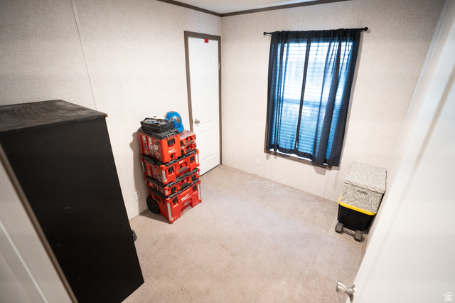 2491 Highway 89, Unit 111 Pleasant View, UT 84404 - Photo 17 of 20 Bedroom with light colored carpet