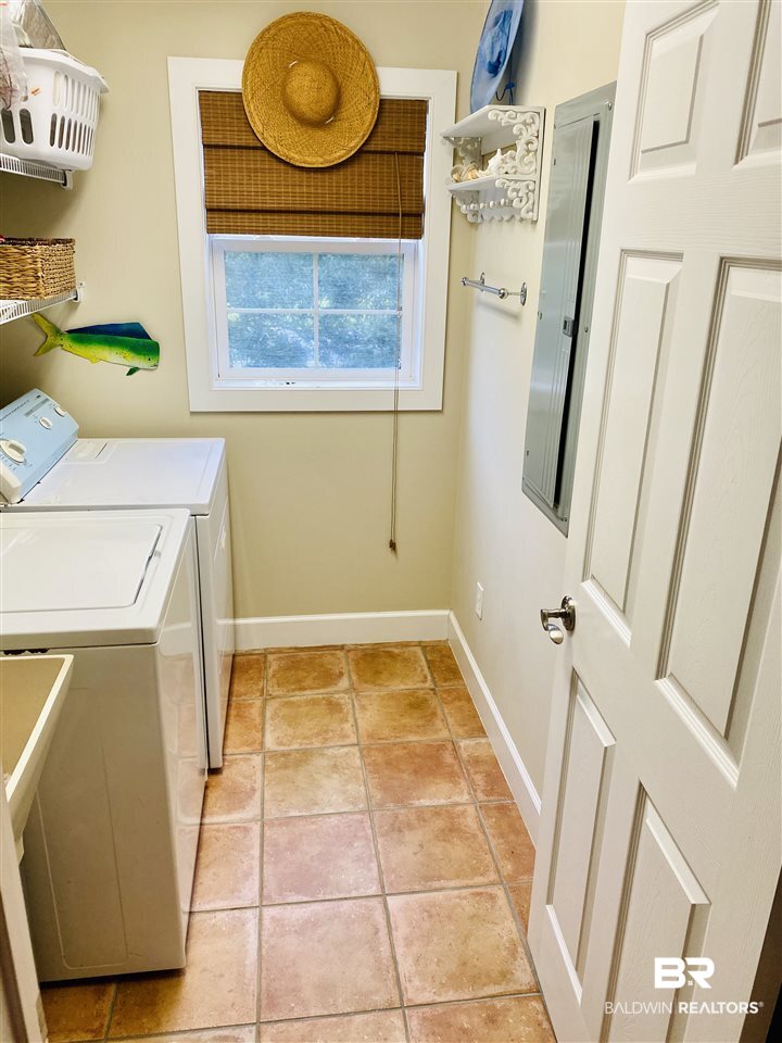 3971 Oleander Court Orange Beach, AL 36561 - Photo 30 of 31 Laundry Room with storage