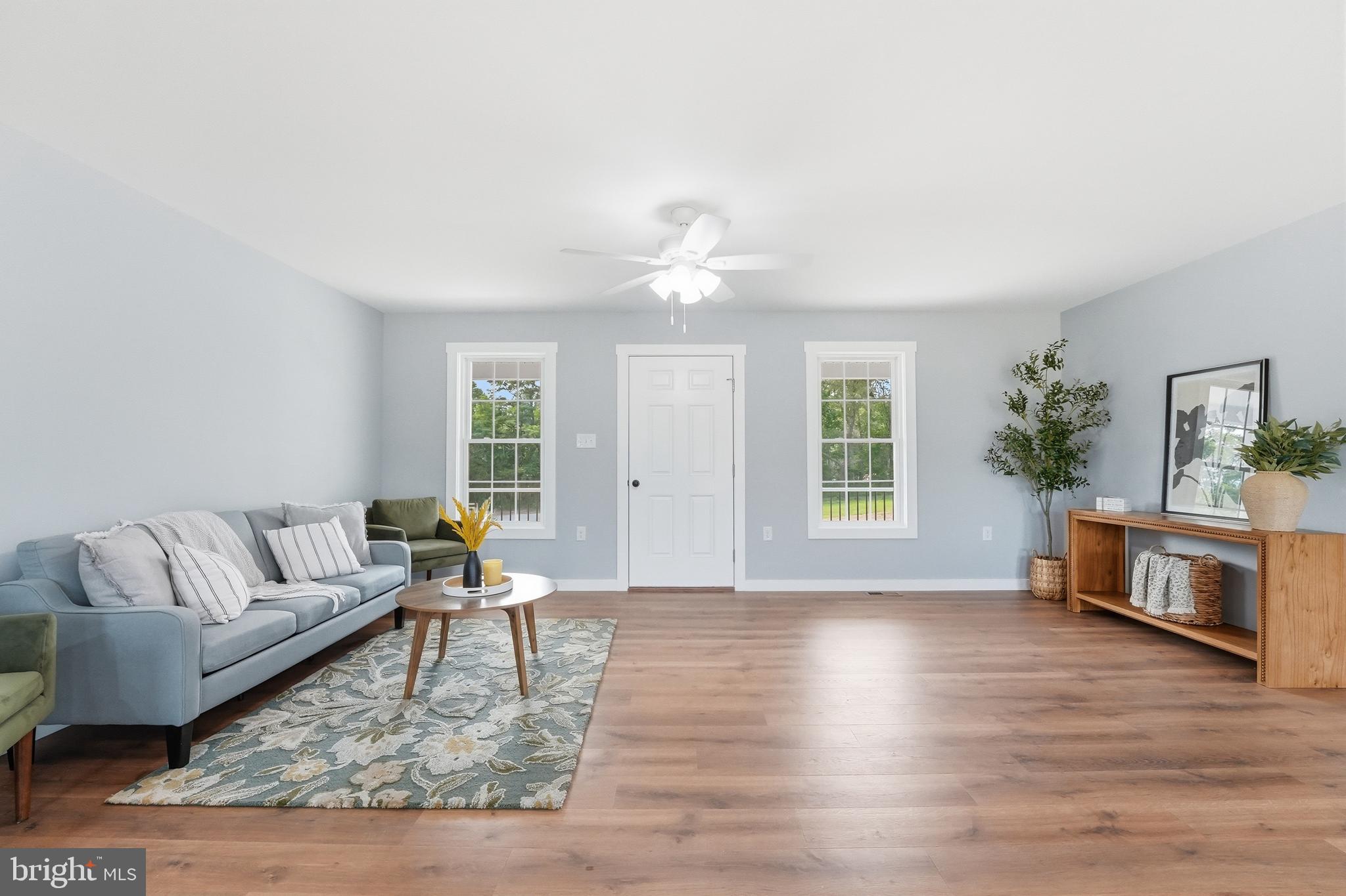 2974 Novum Road Reva, VA 22735 - Photo 15 of 44 a living room with furniture and a large window
