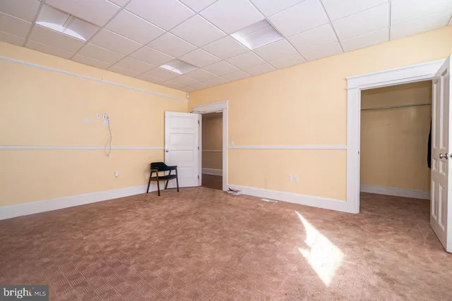 a view of a room next to a window